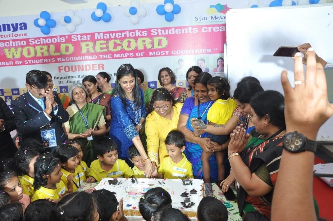 Children and educators celebrating the countries and capitals record event.