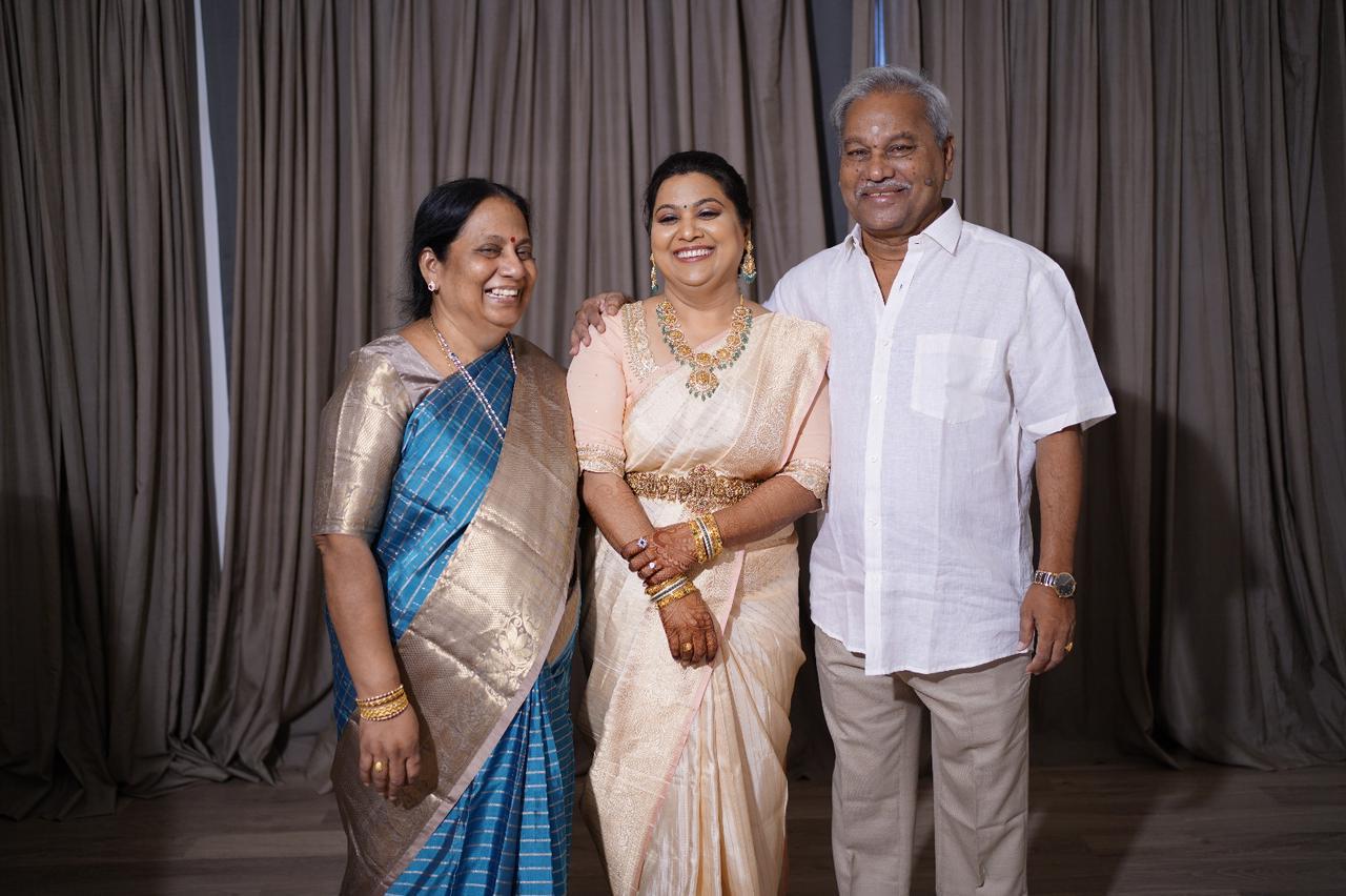 Pushpavalli with her parents.